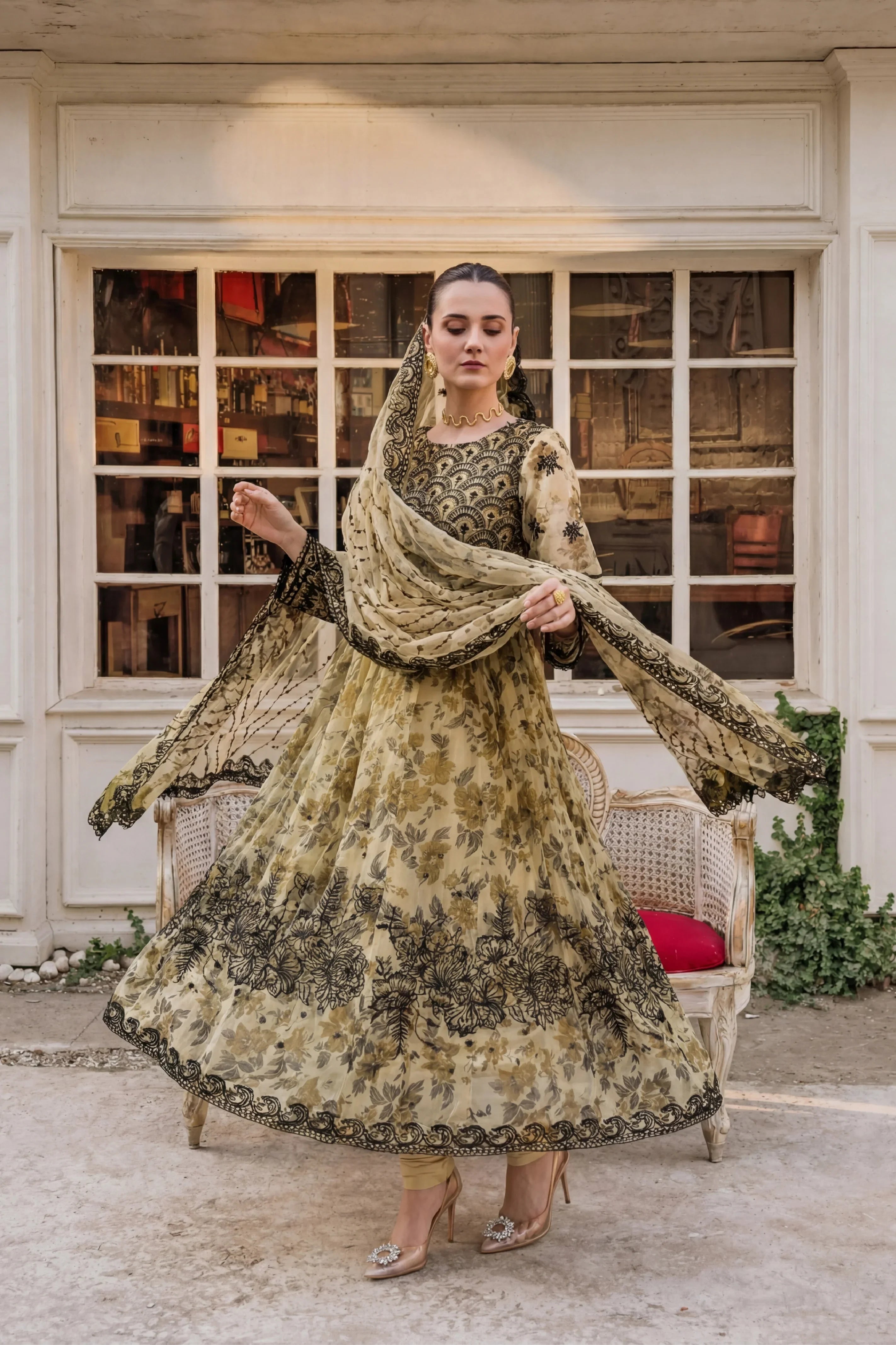 Elegant floral embroidered Pakistani dress with lace detailing, perfect for weddings and formal occasions.