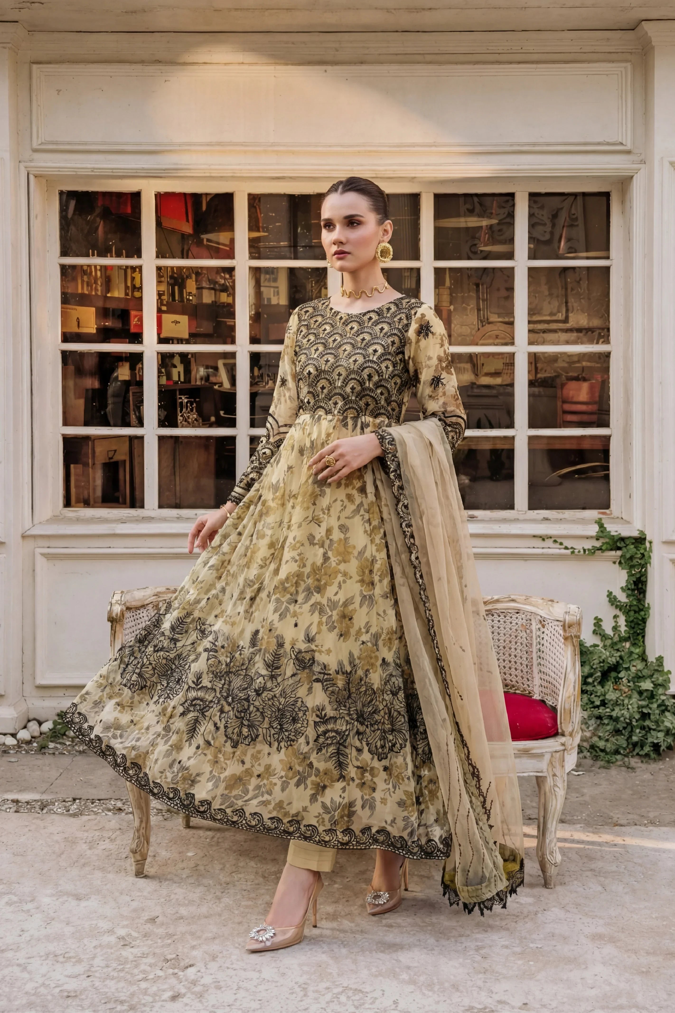 Elegant floral embroidered dress with black detailing, perfect for formal occasions in Pakistan.