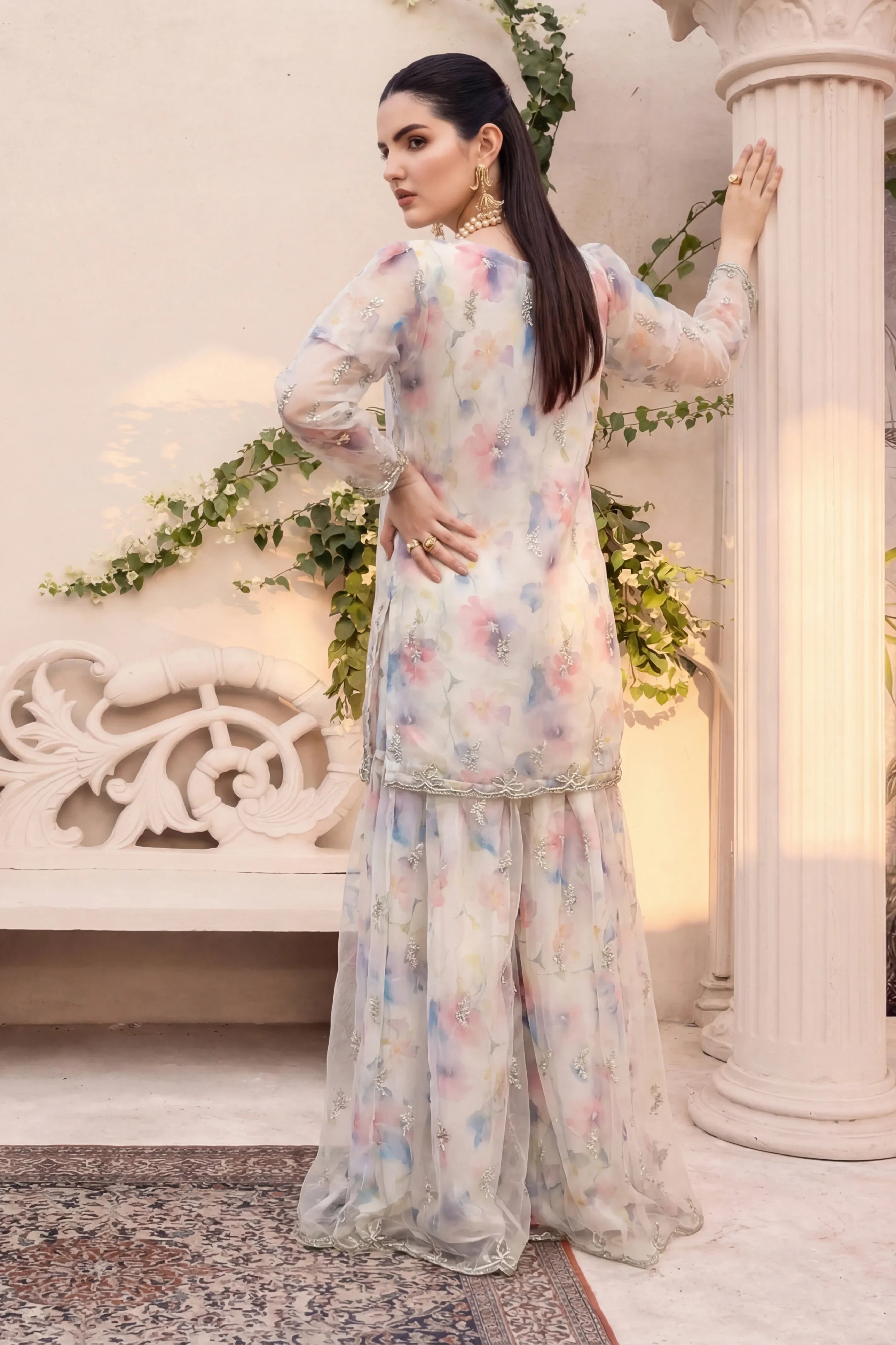 Elegant floral printed Pakistani dress with embroidery, perfect for weddings and special occasions.