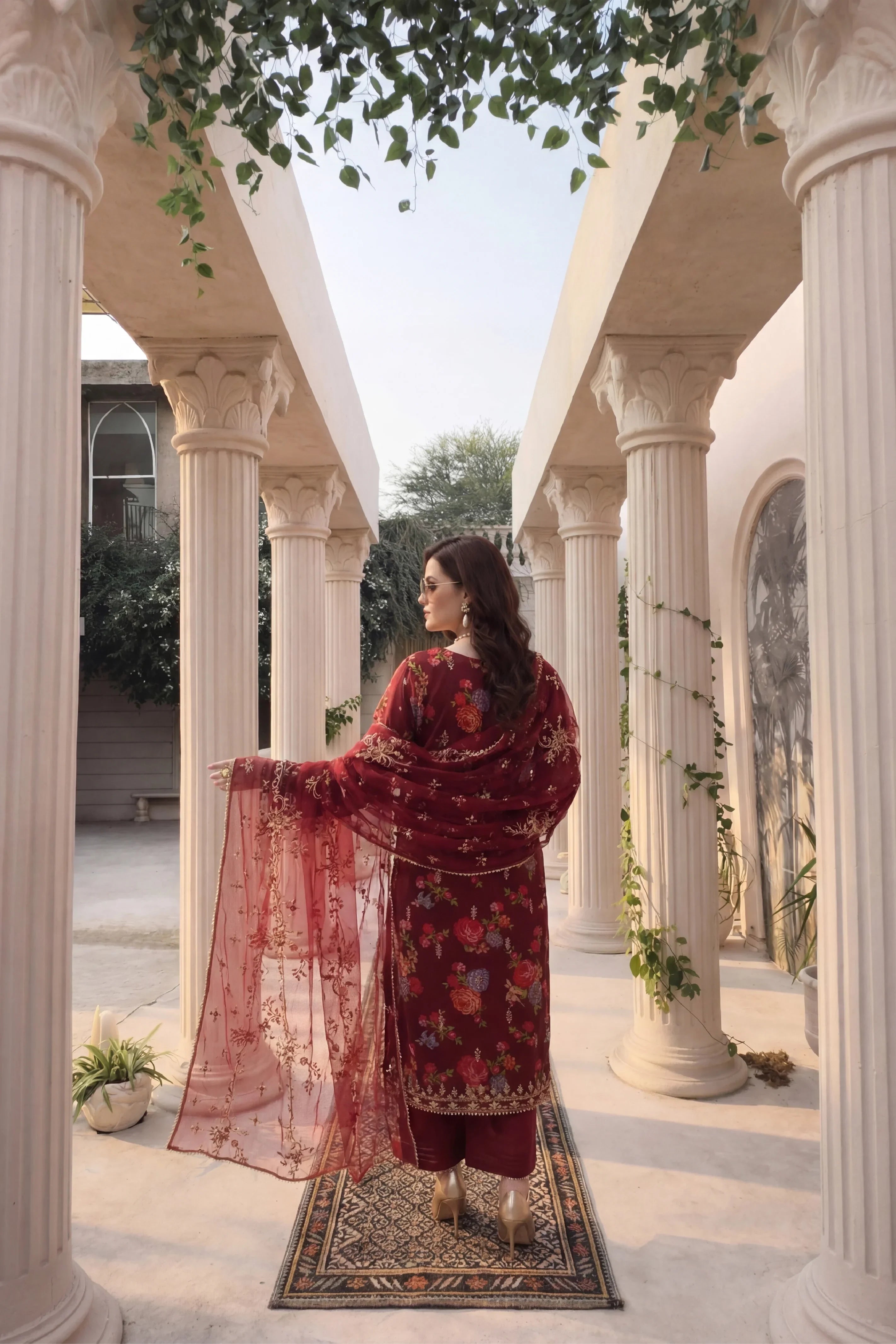 Elegant maroon floral embroidered dress with matching dupatta, styled for Pakistani women&