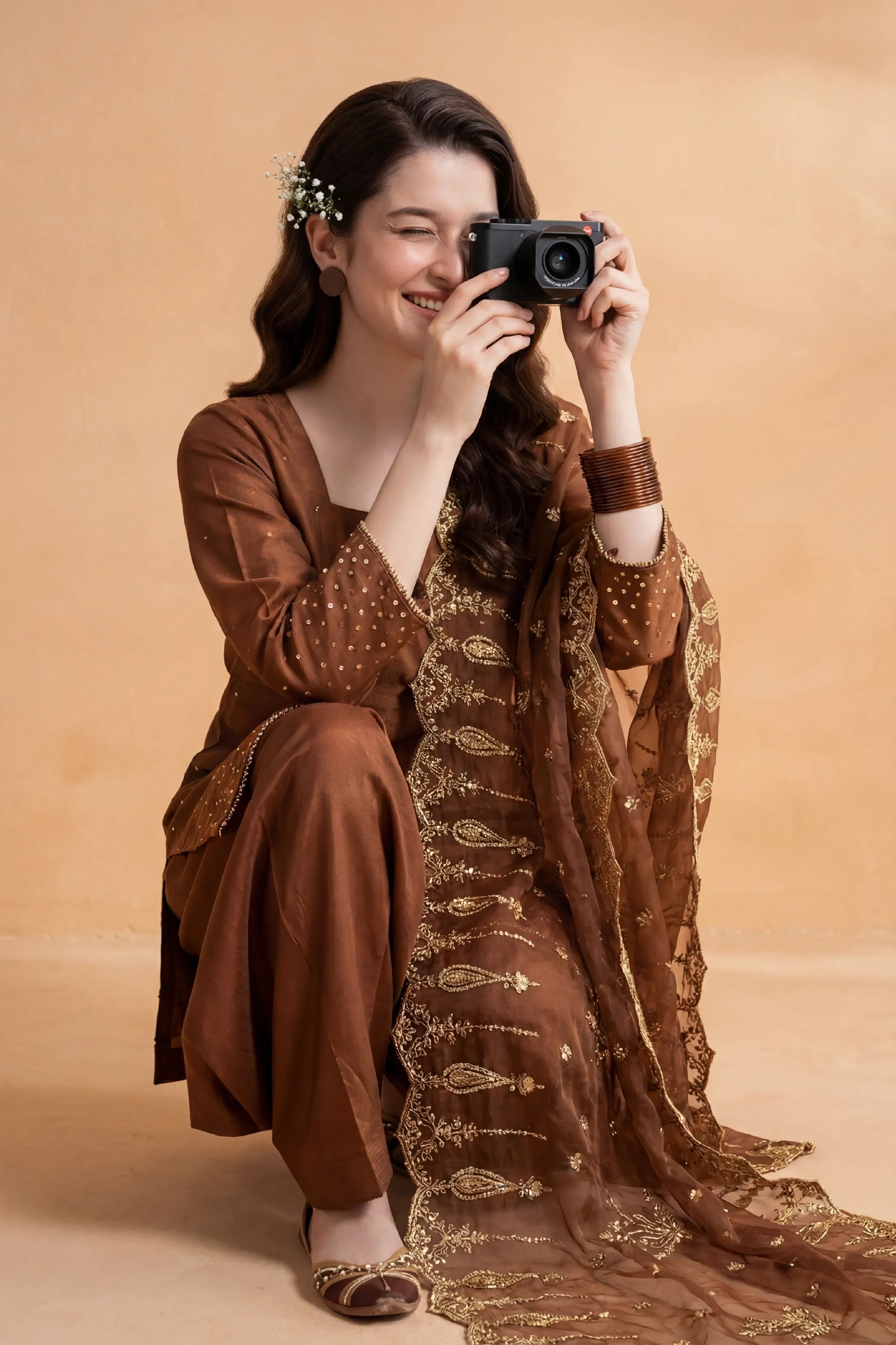 Elegant brown embroidered dress with gold detailing, perfect for women&