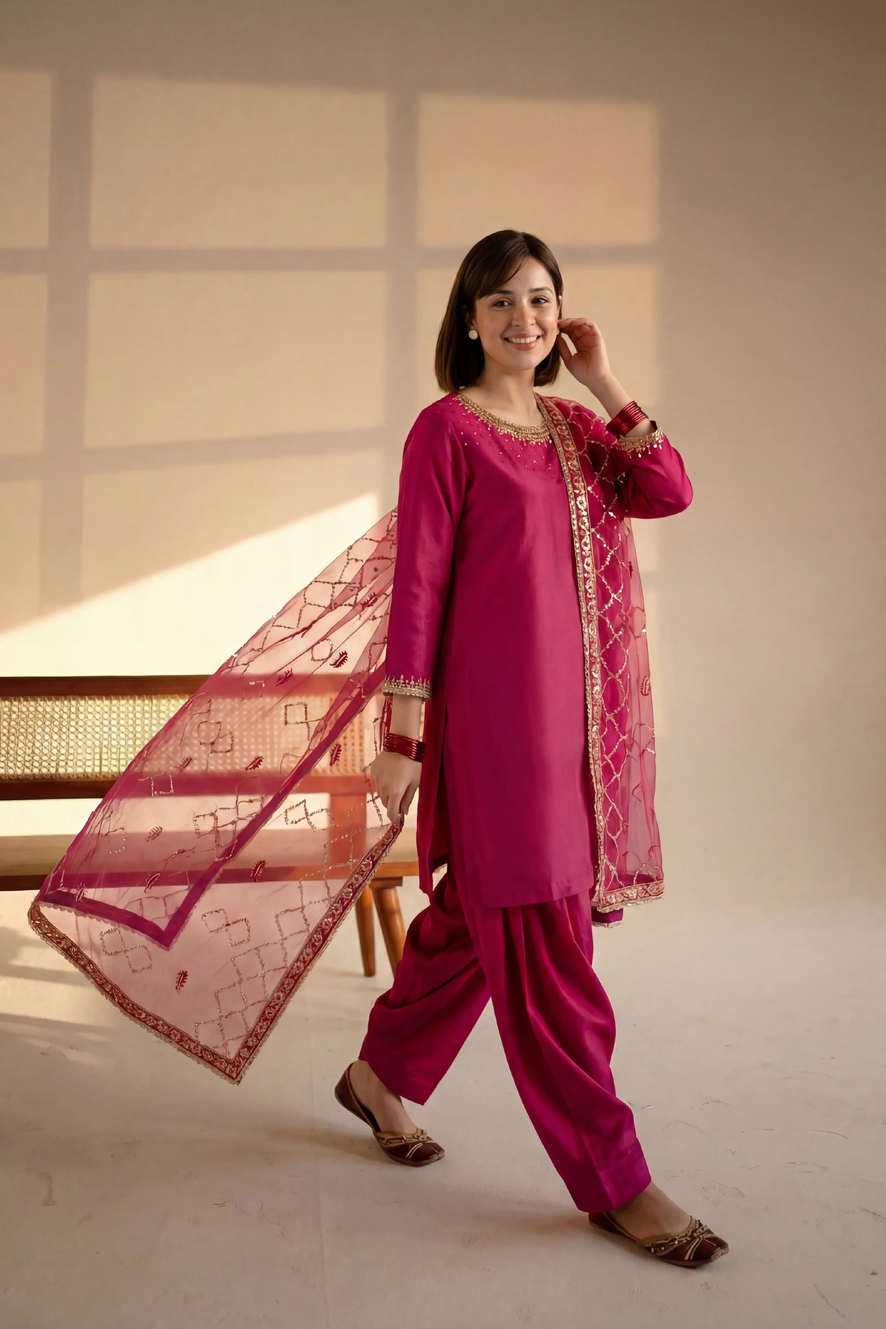 Elegant magenta Pakistani suit with gold embroidery, matching dupatta, and palazzo pants for women&