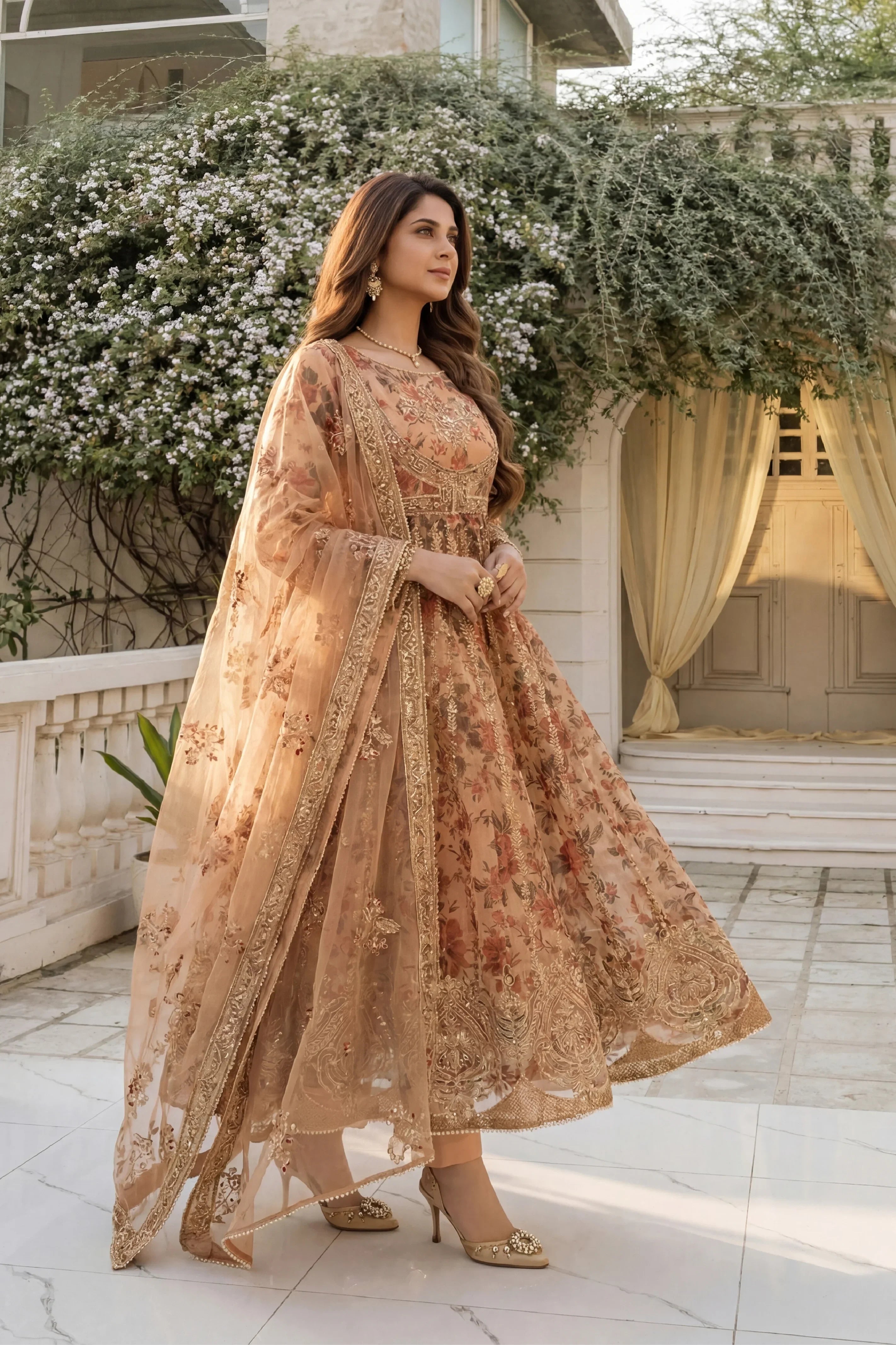 Elegant beige floral embroidered dress with gold detailing, perfect for weddings and special occasions in Pakistan.