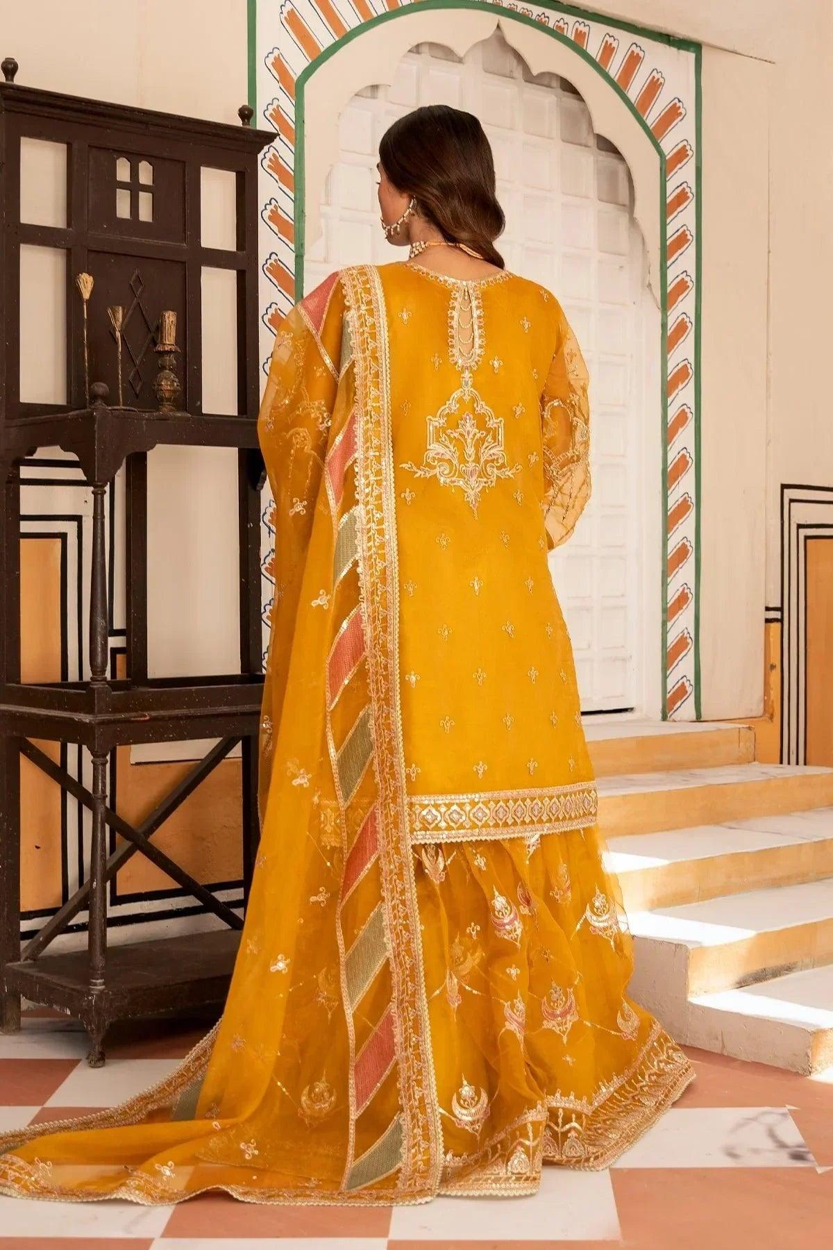 Yellow embroidered Pakistani dress with dupatta, elegant back design, traditional wear for women