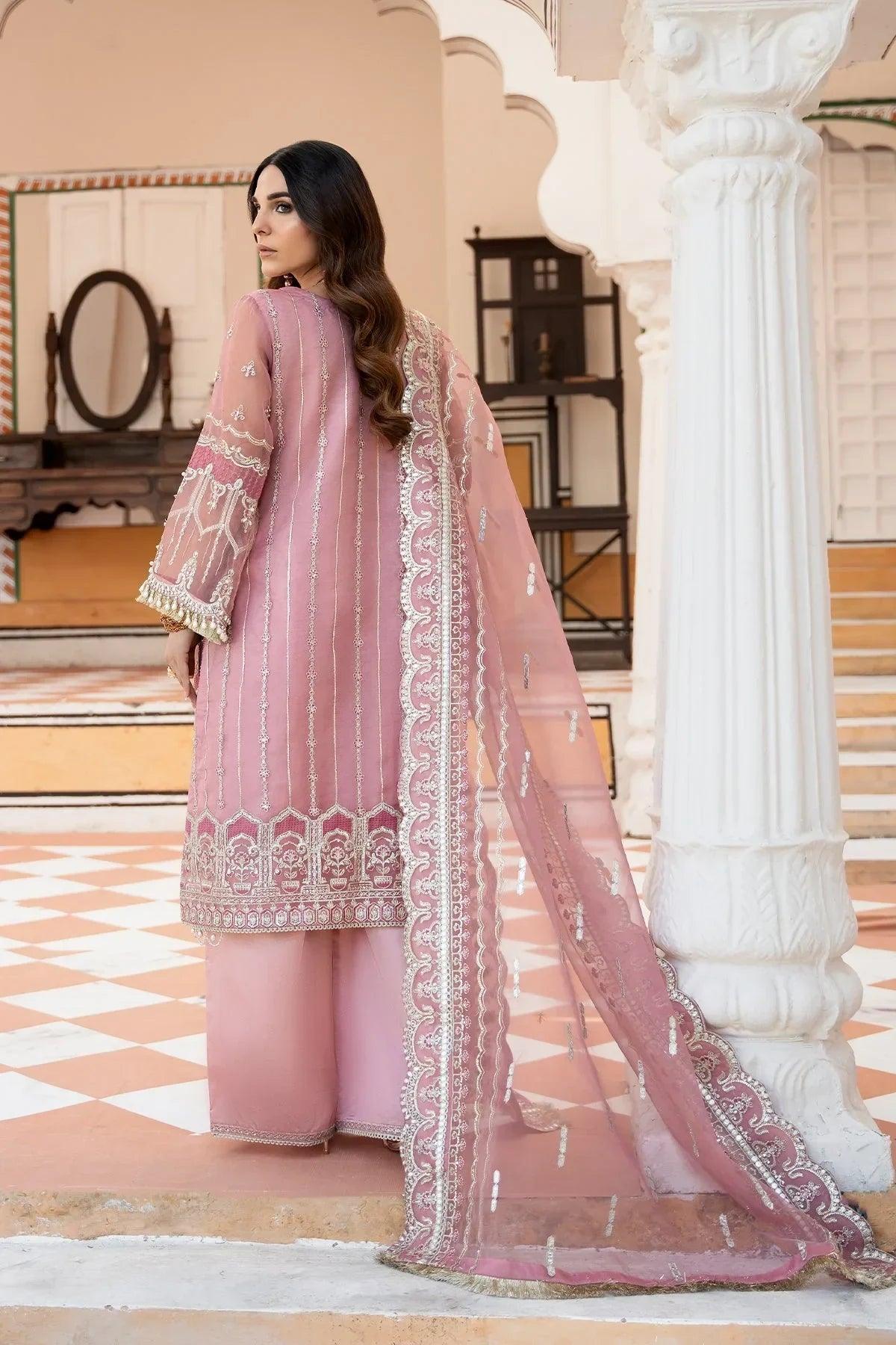Elegant pink embroidered dress with matching dupatta, perfect for traditional occasions.