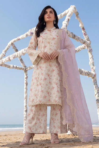 Floral printed stitched dress with lace detailing, paired with sheer dupatta, beach setting