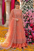 Elegant peach embroidered anarkali suit with floral backdrop, perfect for weddings and special occasions in Pakistan.