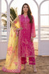 Pink embroidered lawn suit with yellow floral dupatta, beach backdrop, elegant women&