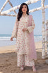 Floral printed stitched dress with lace detailing, paired with pink dupatta, perfect for beach occasions.