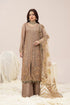 Elegant beige embroidered Pakistani dress with gold detailing, perfect for weddings and formal occasions.
