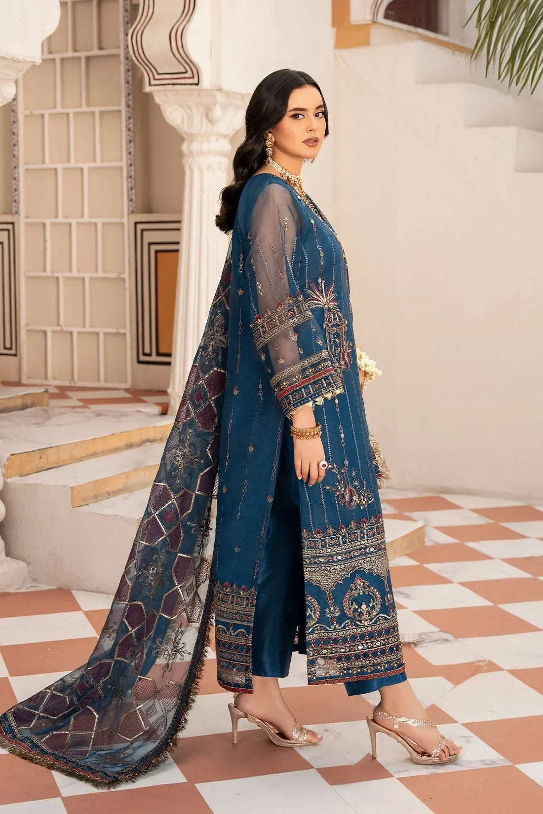 Elegant blue embroidered dress with matching dupatta, perfect for special occasions in Pakistan